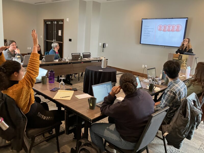 The 2022-23 National Science-Health-Environment Reporting Fellows (SHERF) gather in a room.