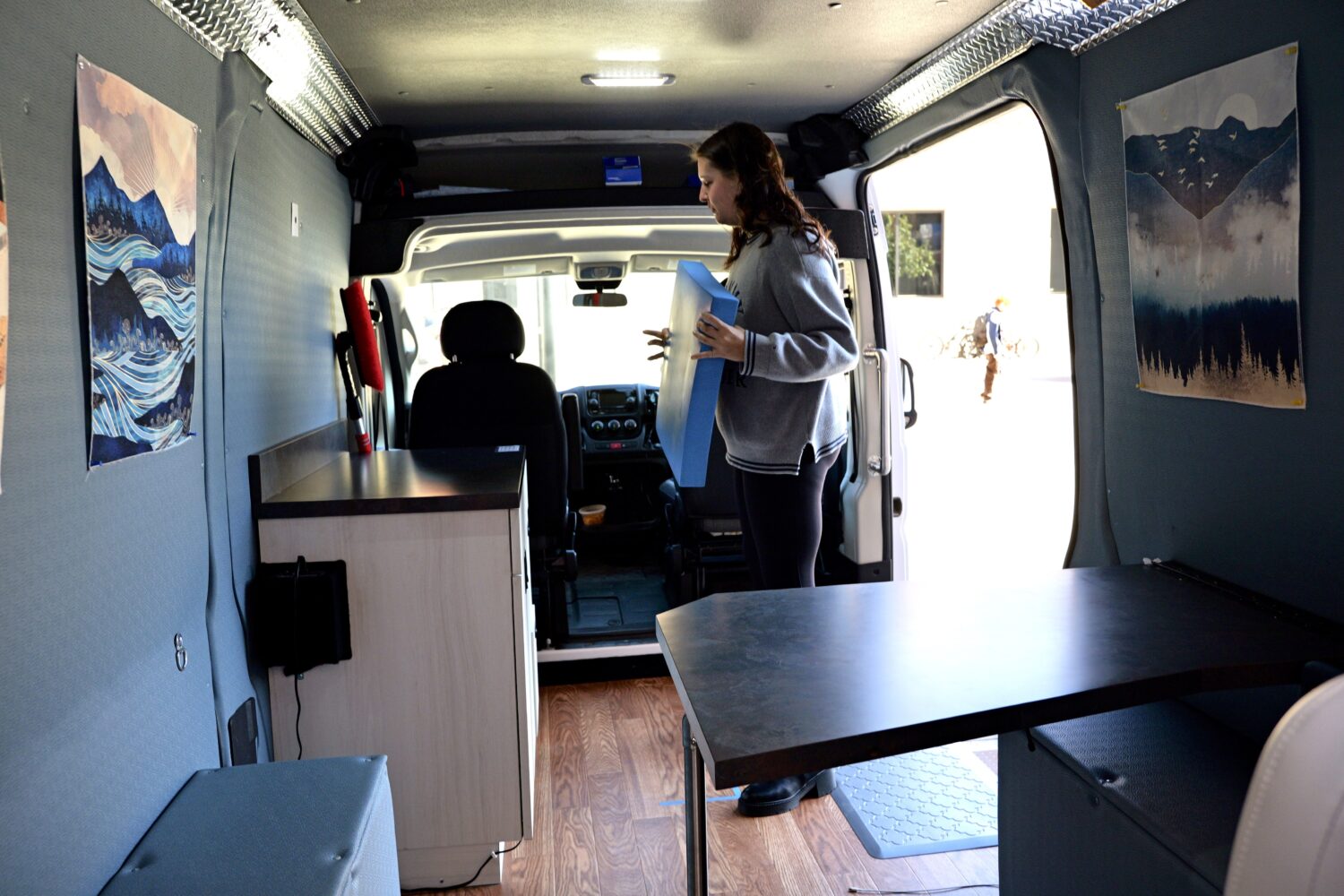 Conference attendees learn about the canniabis research vehicle called the Cannavan.