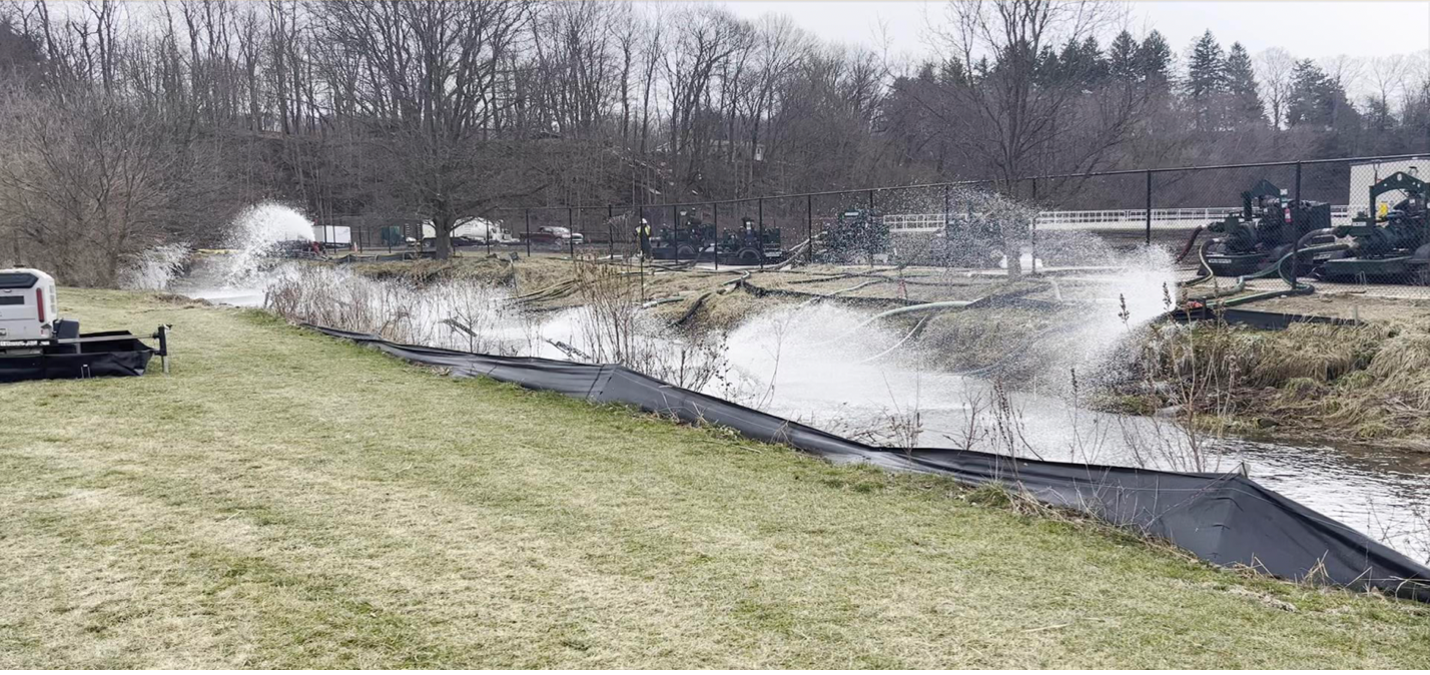 Aeration pumps operating in a creekbed in East Palestine, Ohio