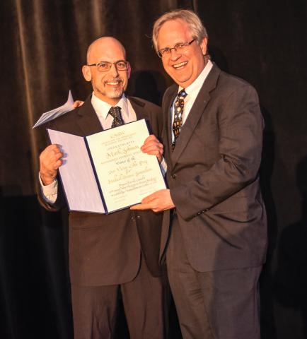 Mark Johnson (left) with CASW President Alan Boyle (right) and the Cohn Prize certificate